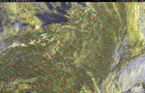 Fig. 1: E-view satellite image at 15 UTC Mon 1 July 2013 with overlaid surface observations.